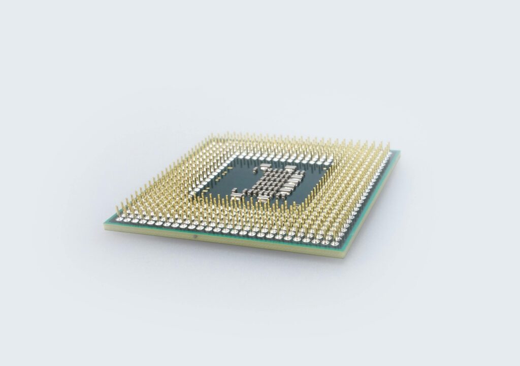 Close-up of a computer processor chip on a circuit board representing NPU and GPU hardware for edge AI inference